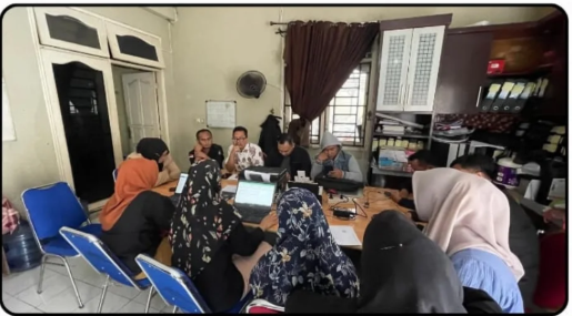 rapat staf